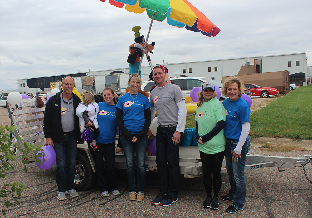 staff in front of truck